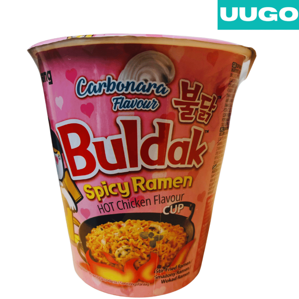a pink container of creamy carbonara buldak noodles