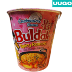a pink container of creamy carbonara buldak noodles